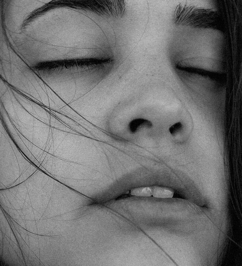 Woman with eyes closed, calm